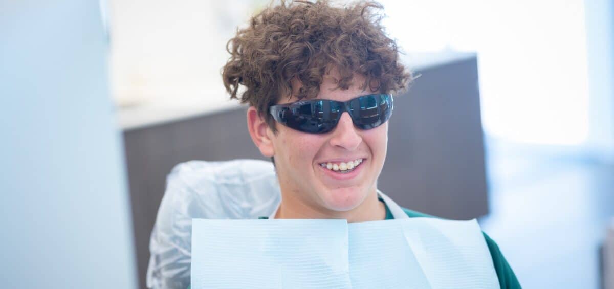 Patient-Candids-Kanning-Orthodontics-2020-Kansas-City-Missouri-Orthodontist-17-1200x565 My Teeth Hurt! What's the Best Way to Stop Braces Pain?  - Braces and Invisalign in Liberty, Missouri - Kanning Orthodontics